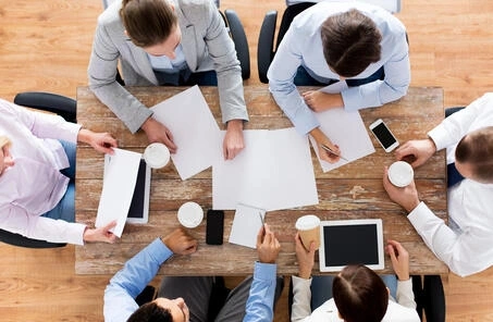 Image of a working group at an office from above