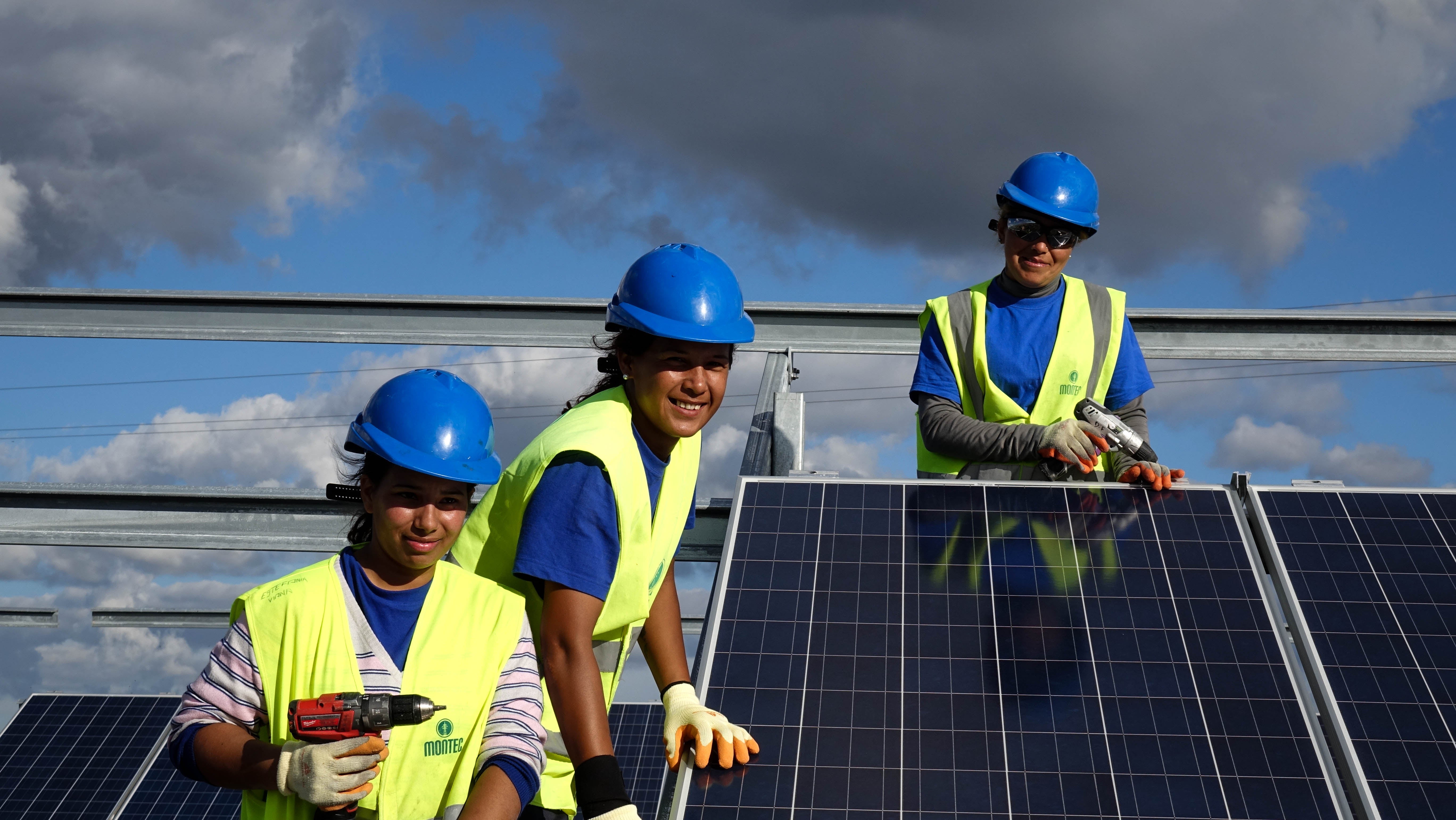 Solar panels installation workers