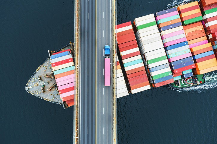 Image of a bridge over a trade ship