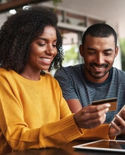 Couple purchasing through online shopping 