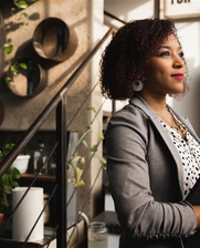 A young woman entrepreneur in her business