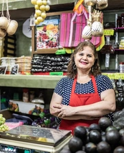 Image of a smiling fruits and vegetables Mexican entrepreneur woman