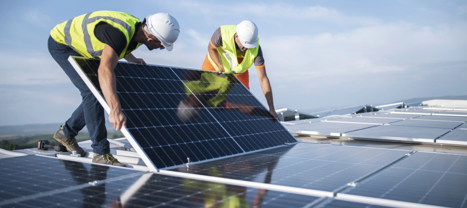 Image of workers of a solar energy plant