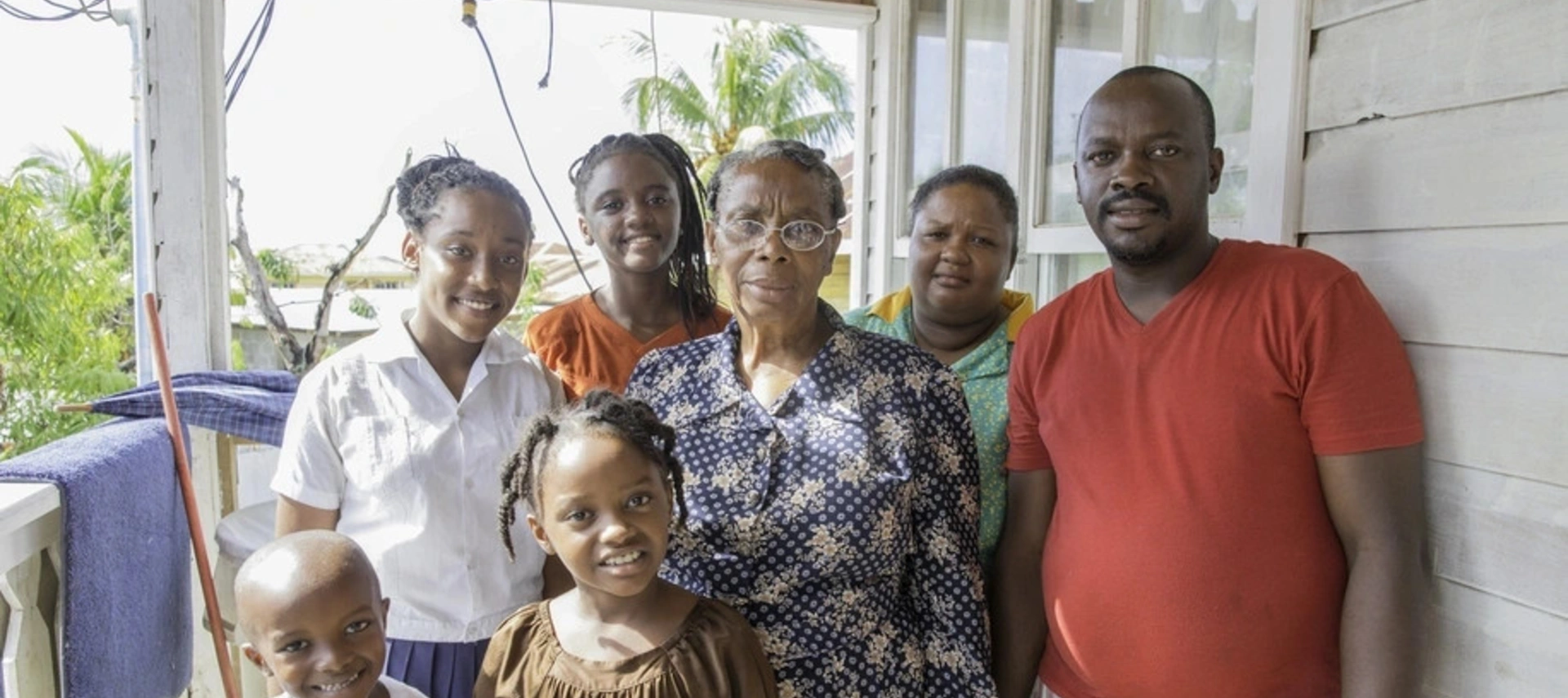 Image of a family from the Caribbean moving to their new home