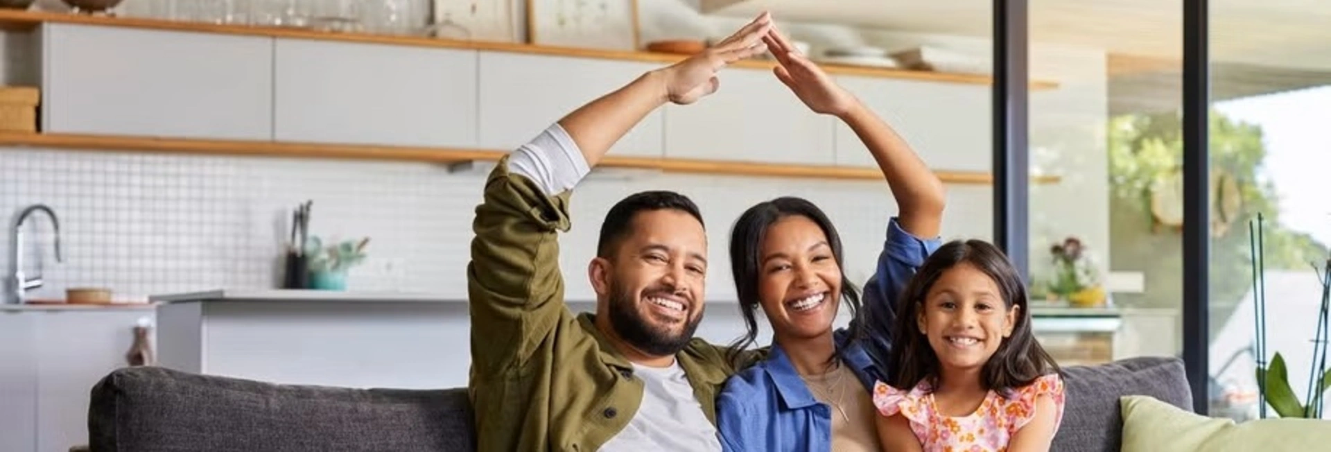 Image of a family celebrating they have a new home