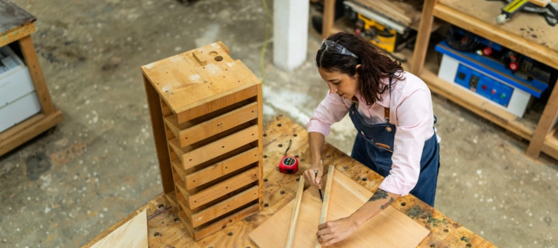 A woman in her carpentry business