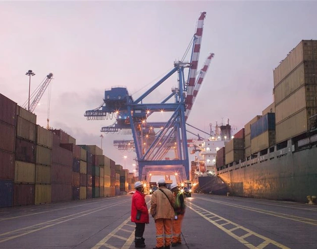Workers in a port yard