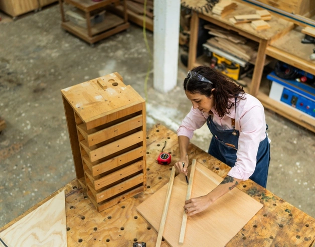 A woman in her carpentry business