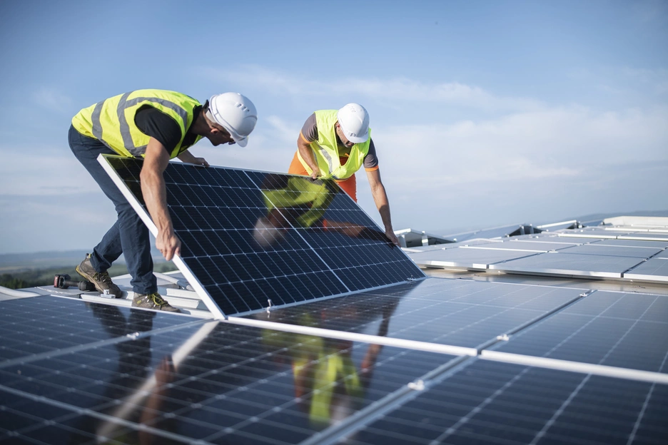 Image of workers of a solar energy plant