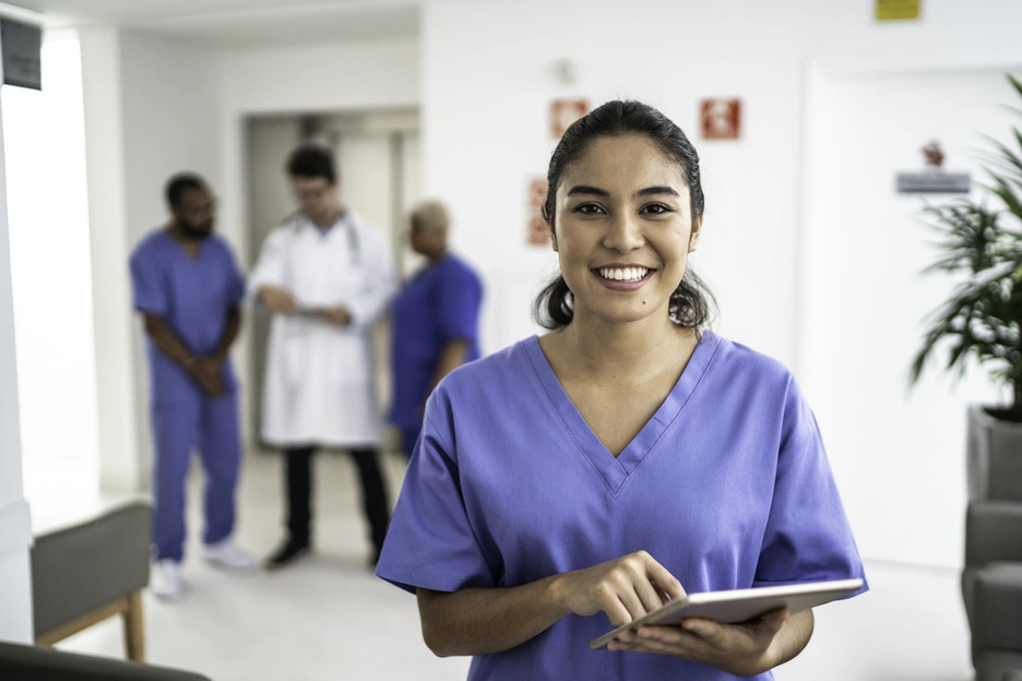 Image showing a hispanic nurse looking at camera