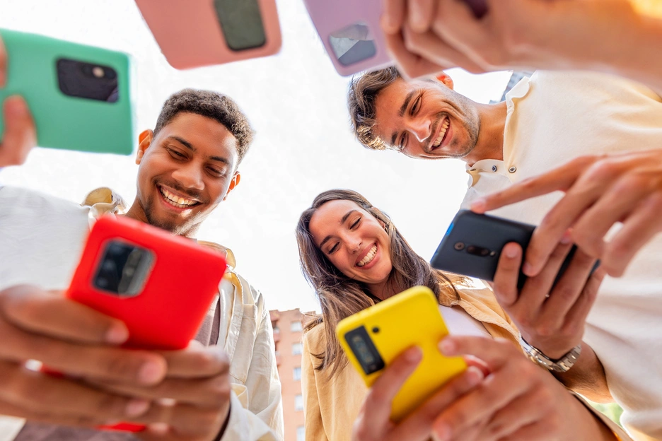 youth holding cell phones