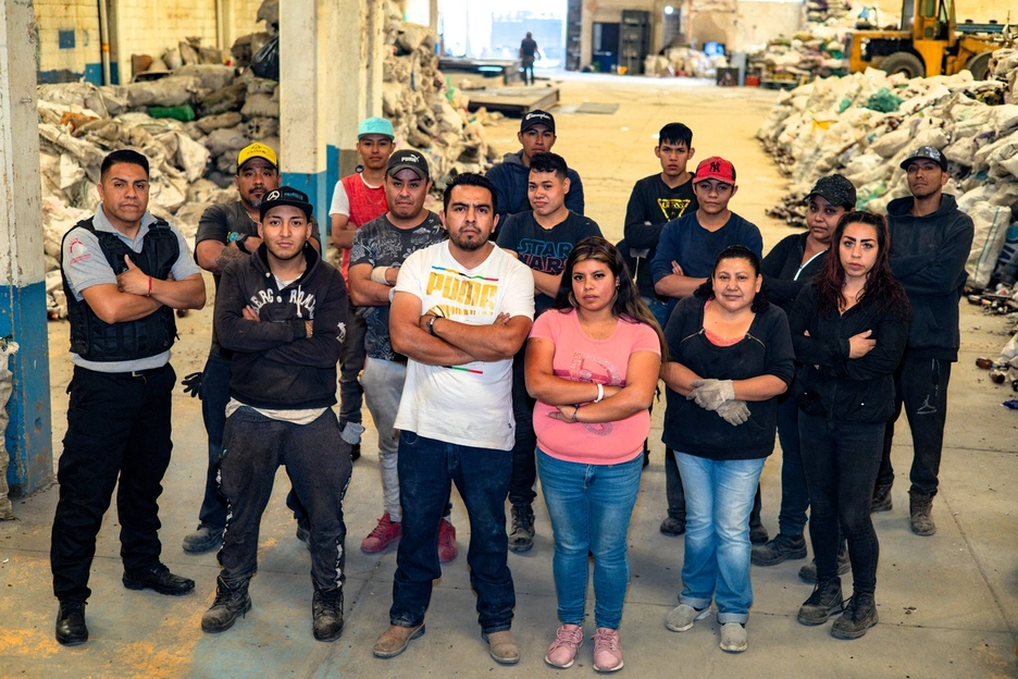 Recyclers standing in group