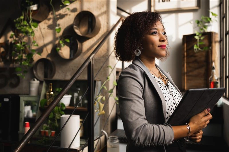 A young woman entrepreneur in her business