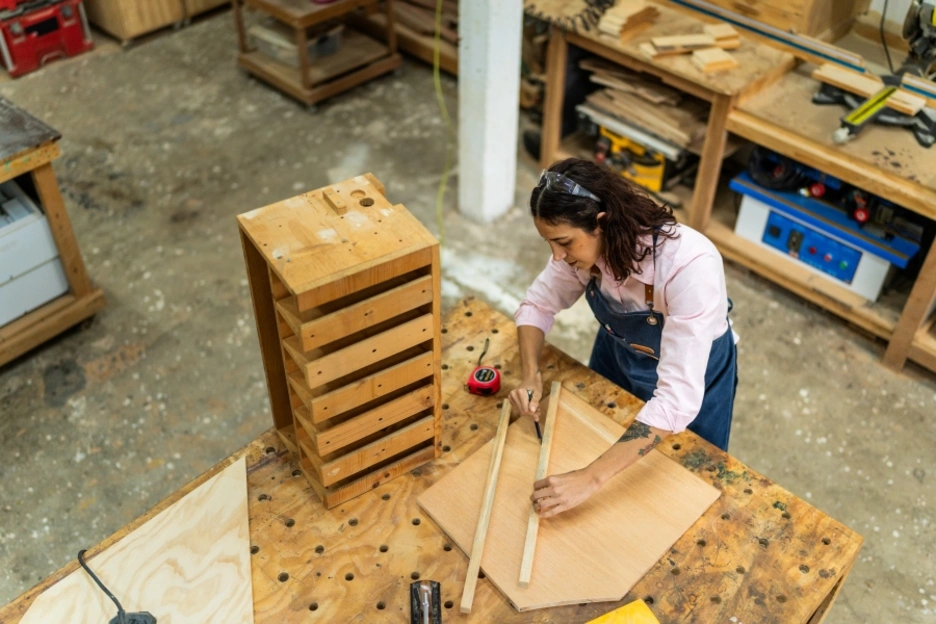 A woman in her carpentry business